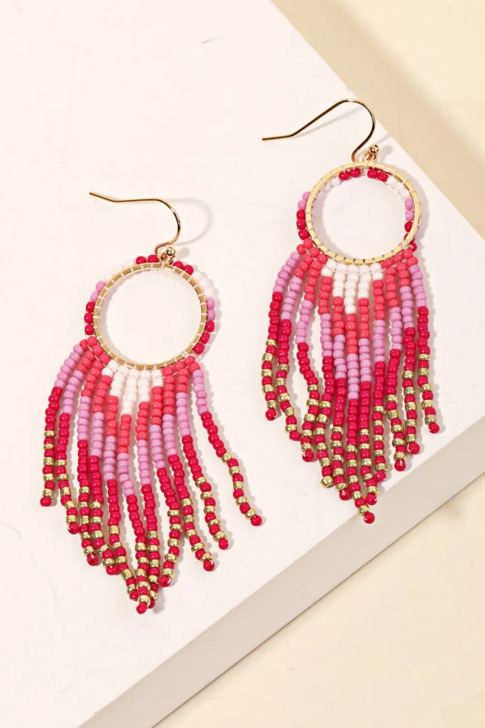 FAME CIRCLE CUTOUT SEED BEADED FRINGE EARRINGS